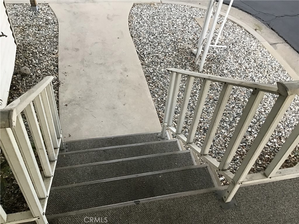 7271 Katella Stanton, CA 90680 - Photo 10 of 43 a view of entryway with stairs