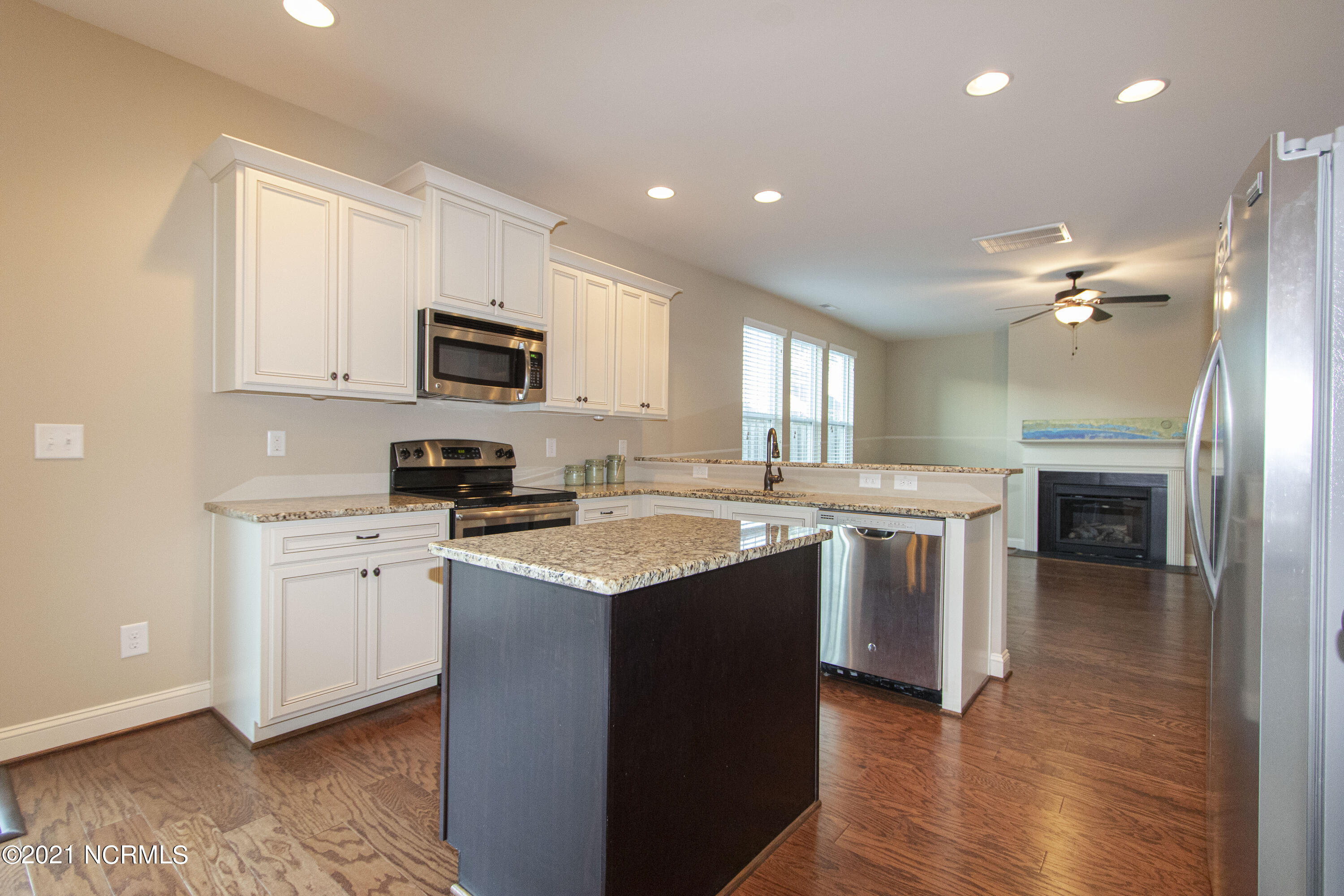 209 Willow Ridge Drive Holly Ridge, NC 28445 - Photo 7 of 27 Kitchen to Living