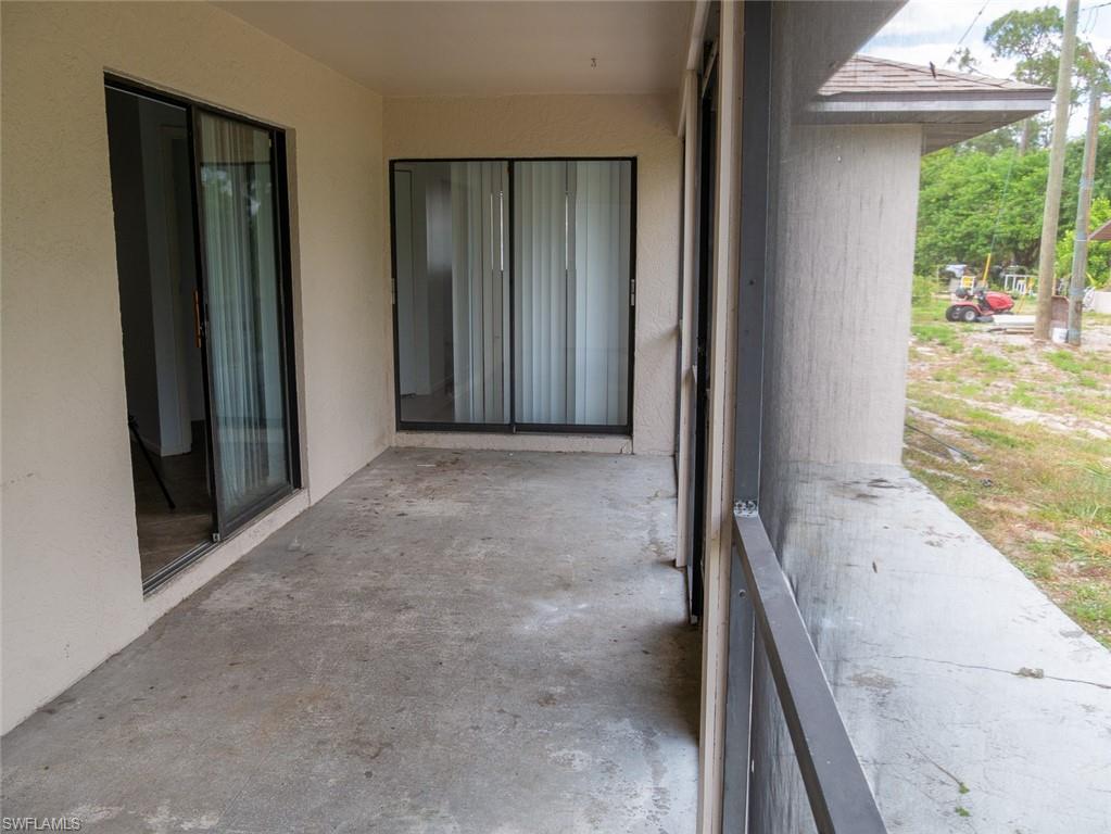 19029-19031 Holly Road Fort Myers, FL 33967 - Photo 14 of 15 View of patio / terrace