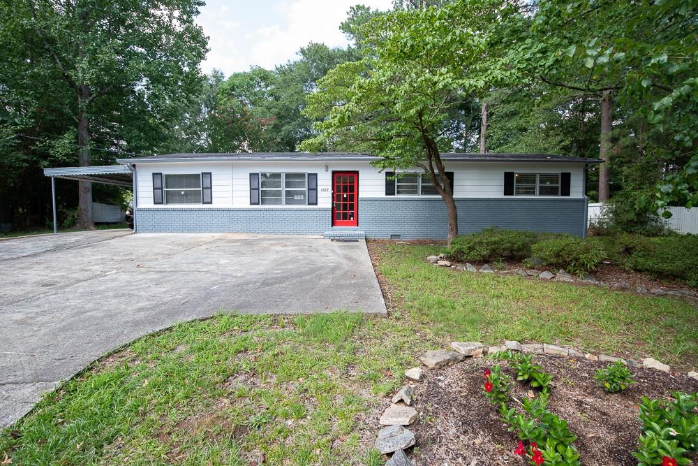 4322 Macedonia Road Powder Springs, GA 30127 - Photo 1 of 1 front view of a house with a yard
