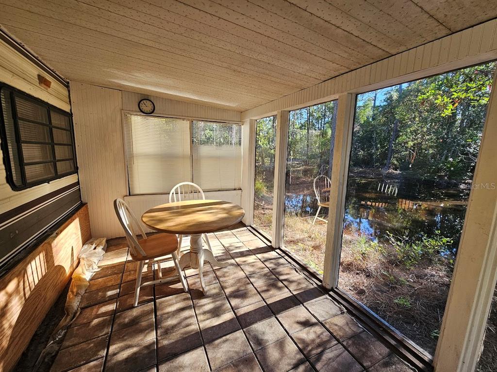 804 Shell Harbor Road Pierson, FL 32180 - Photo 6 of 27 a living room view with a outdoor seating space