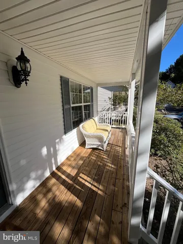 a bedroom with furniture and a potted plant