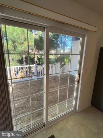 a view of empty room with windows