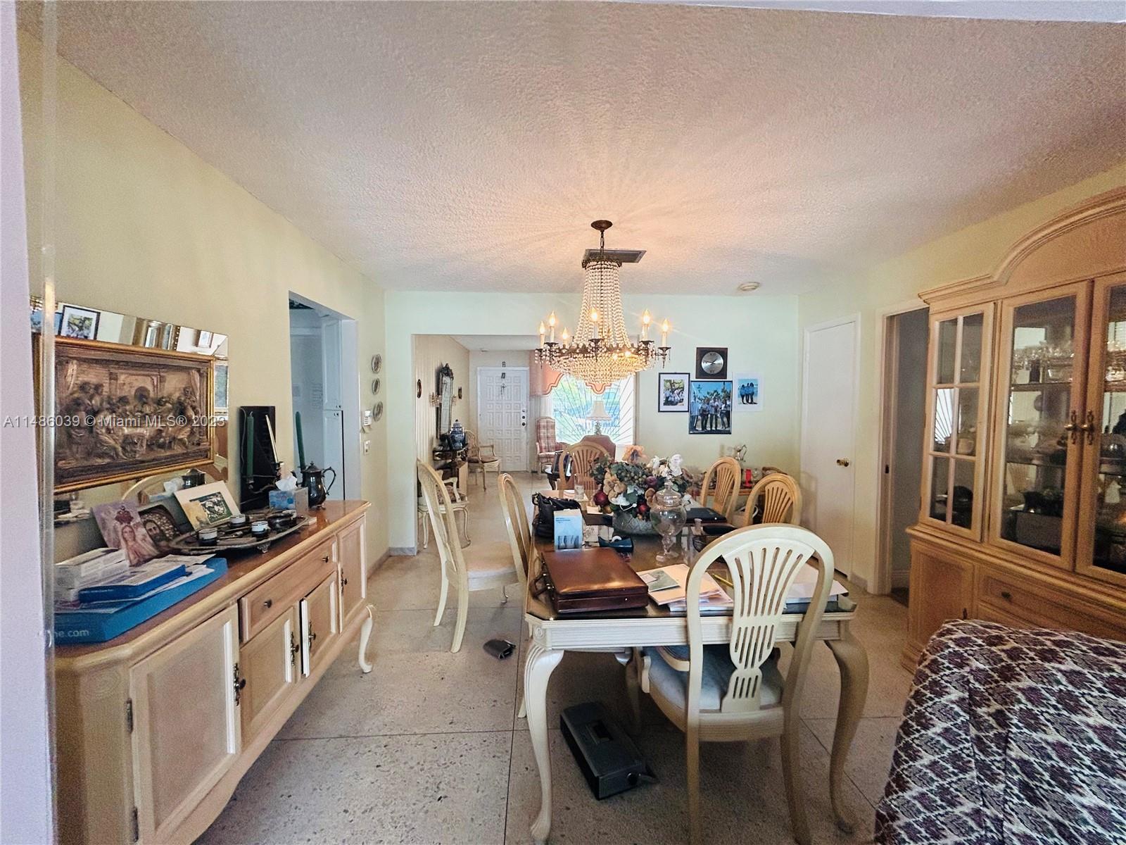 2311 Southwest 23rd Street Miami, FL 33145 - Photo 6 of 21 a living room with furniture and a flat screen tv