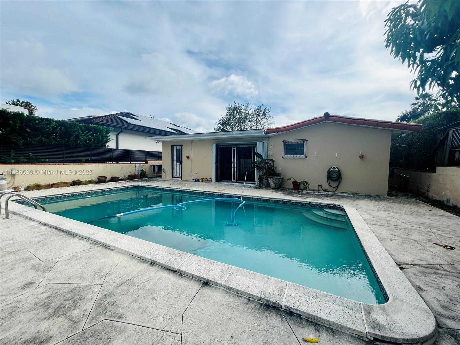 2311 Southwest 23rd Street Miami, FL 33145 - Photo 10 of 21 an outdoor space with swimming pool and furniture
