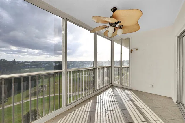 a view of a balcony with a potted plant