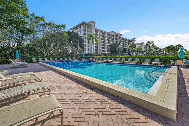 a view of a lake with tall buildings