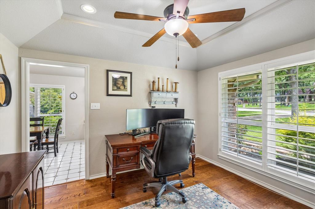404 Moonlight Lane Keller, TX 76248 - Photo 12 of 40 a view of a workspace with furniture and a window