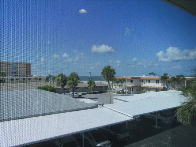 a view of a terrace with sitting area