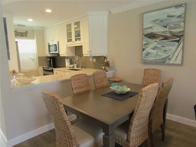 a view of a dining room with furniture