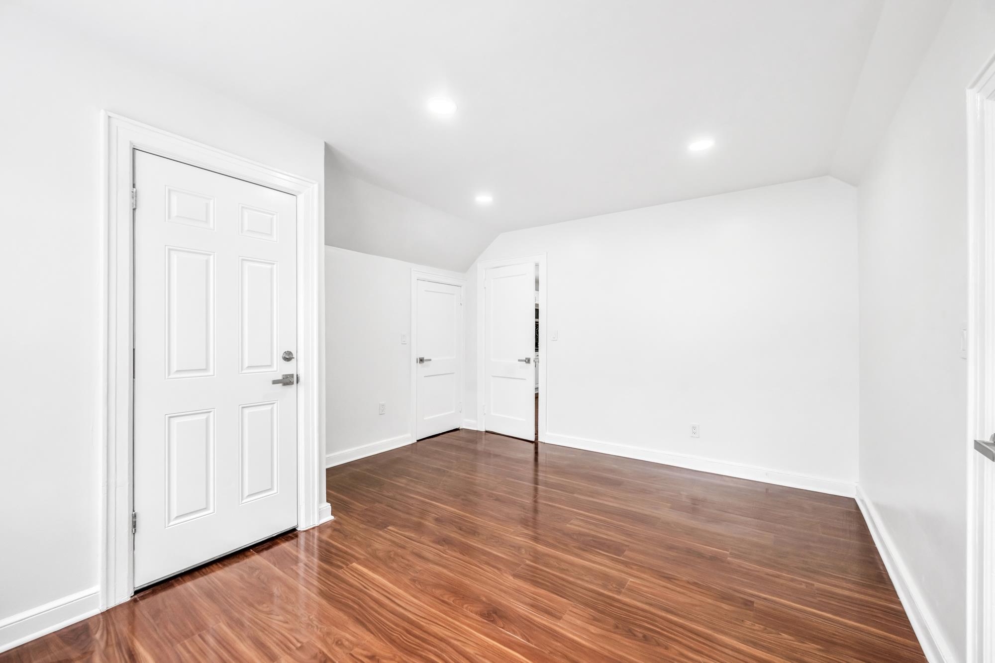 284 MacArthur Avenue, Unit 2 Garfield, NJ 07026 - Photo 17 of 19 a view of an empty room with wooden floor