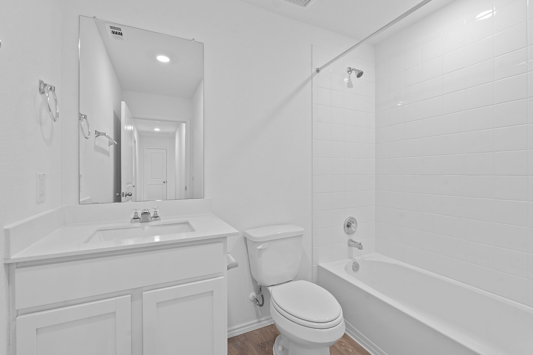 13309 Mancos Shale Road Mustang Ridge, TX 78610 - Photo 14 of 19 a bathroom with a sink a toilet and shower