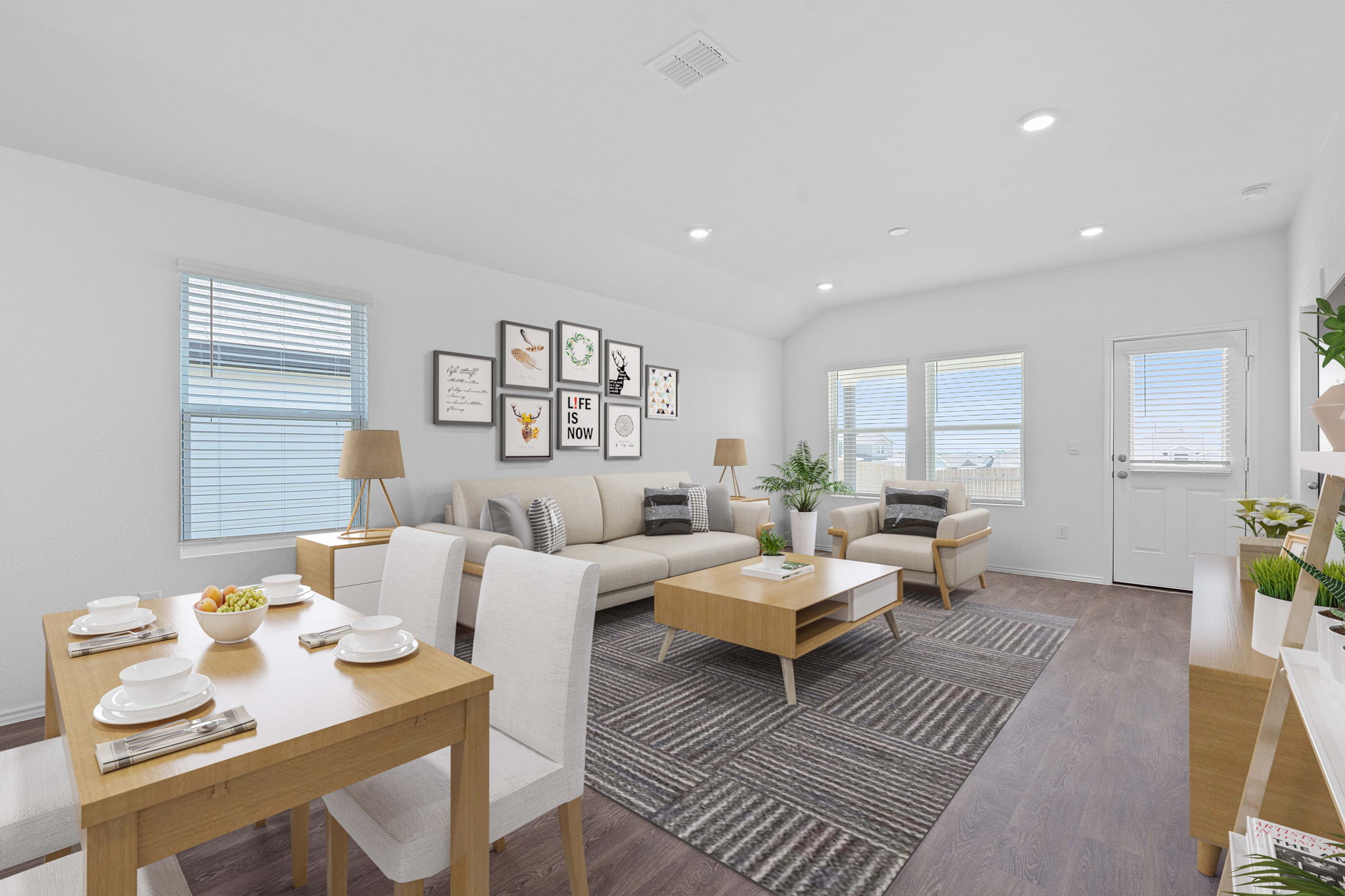13309 Mancos Shale Road Mustang Ridge, TX 78610 - Photo 3 of 19 a living room with furniture and wooden floor