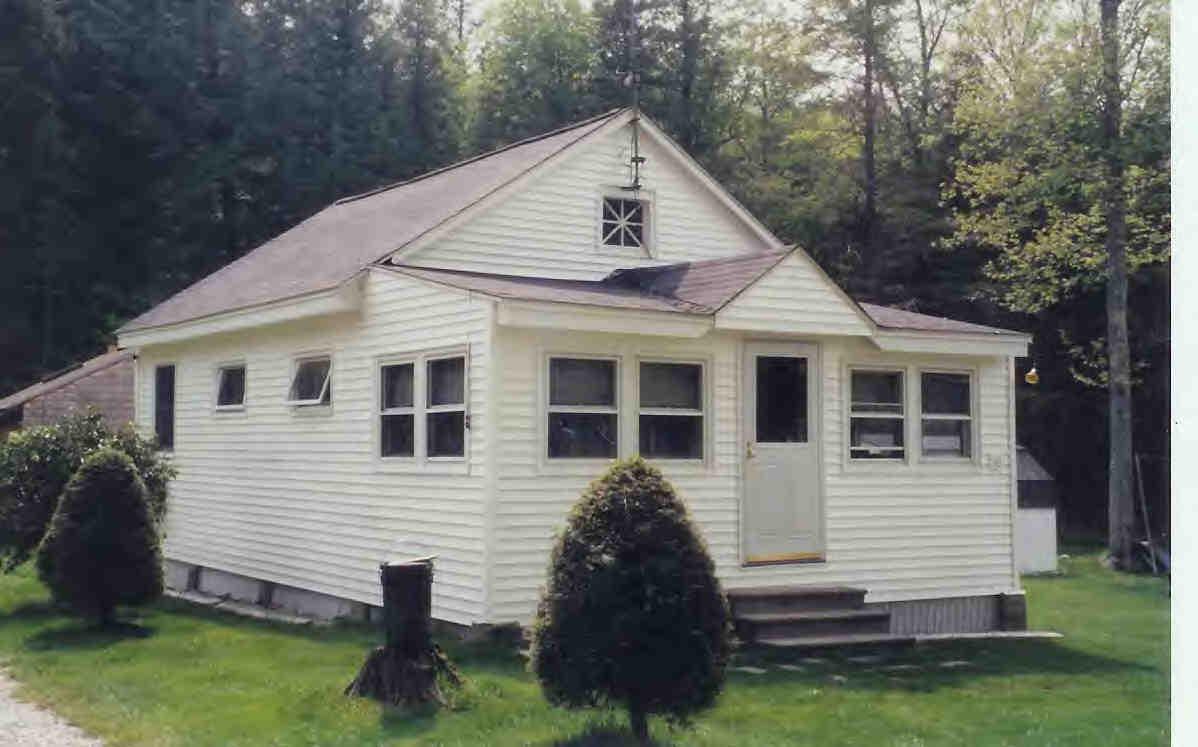 30 Shore Road Becket, MA 01223 - Photo 1 of 2 a view of a house with a yard
