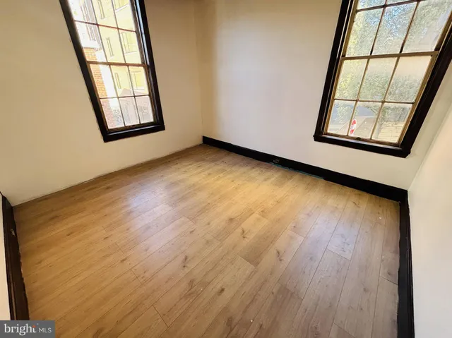 an empty room with windows