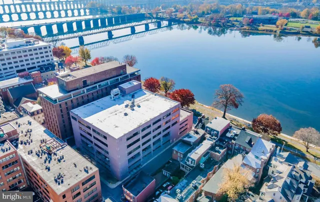 an aerial view of a house with outdoor space