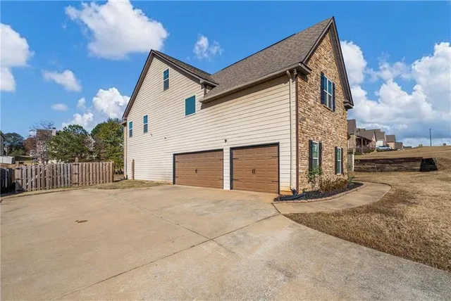 front view of a house with a street