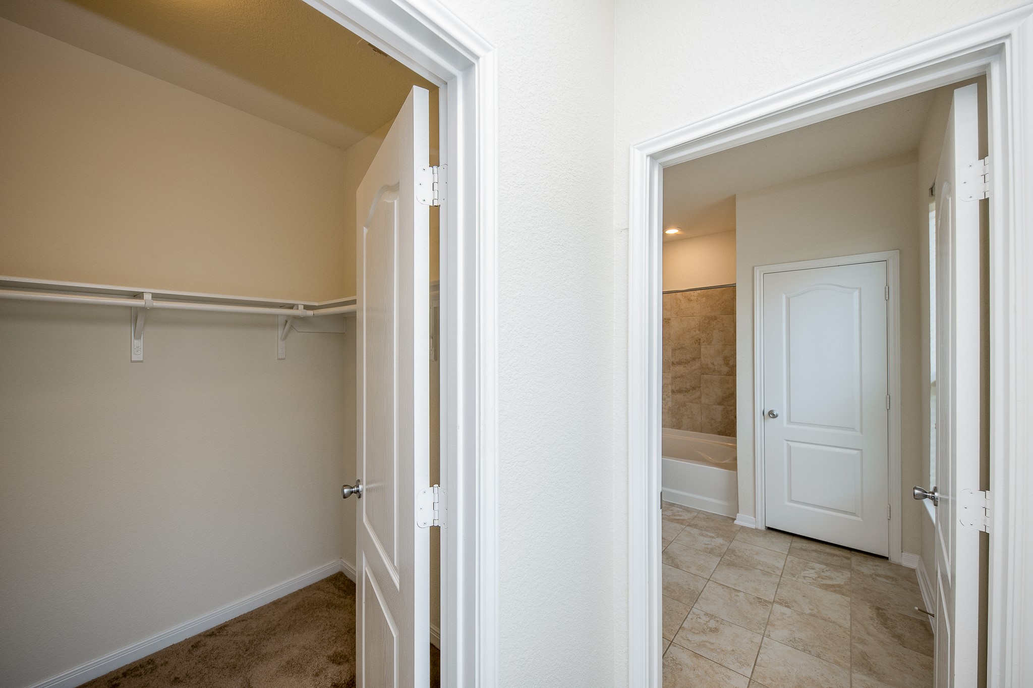 4614 Westgreen Ridge Road Katy, TX 77449 - Photo 14 of 28 Primary Walk-in Closet and Bathroom