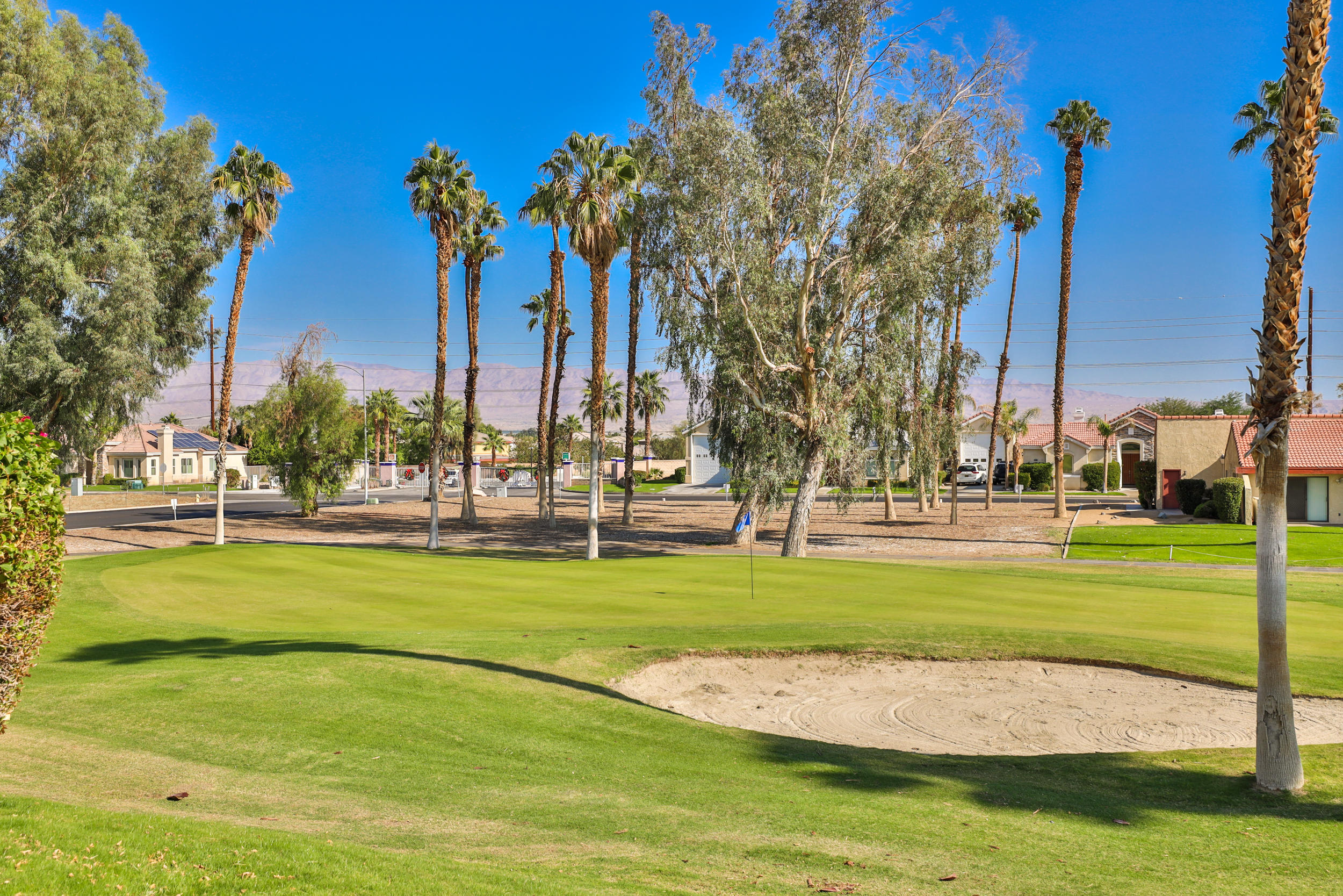 49058 Wayne Street Indio, CA 92201 - Photo 2 of 26 a view of a golf course