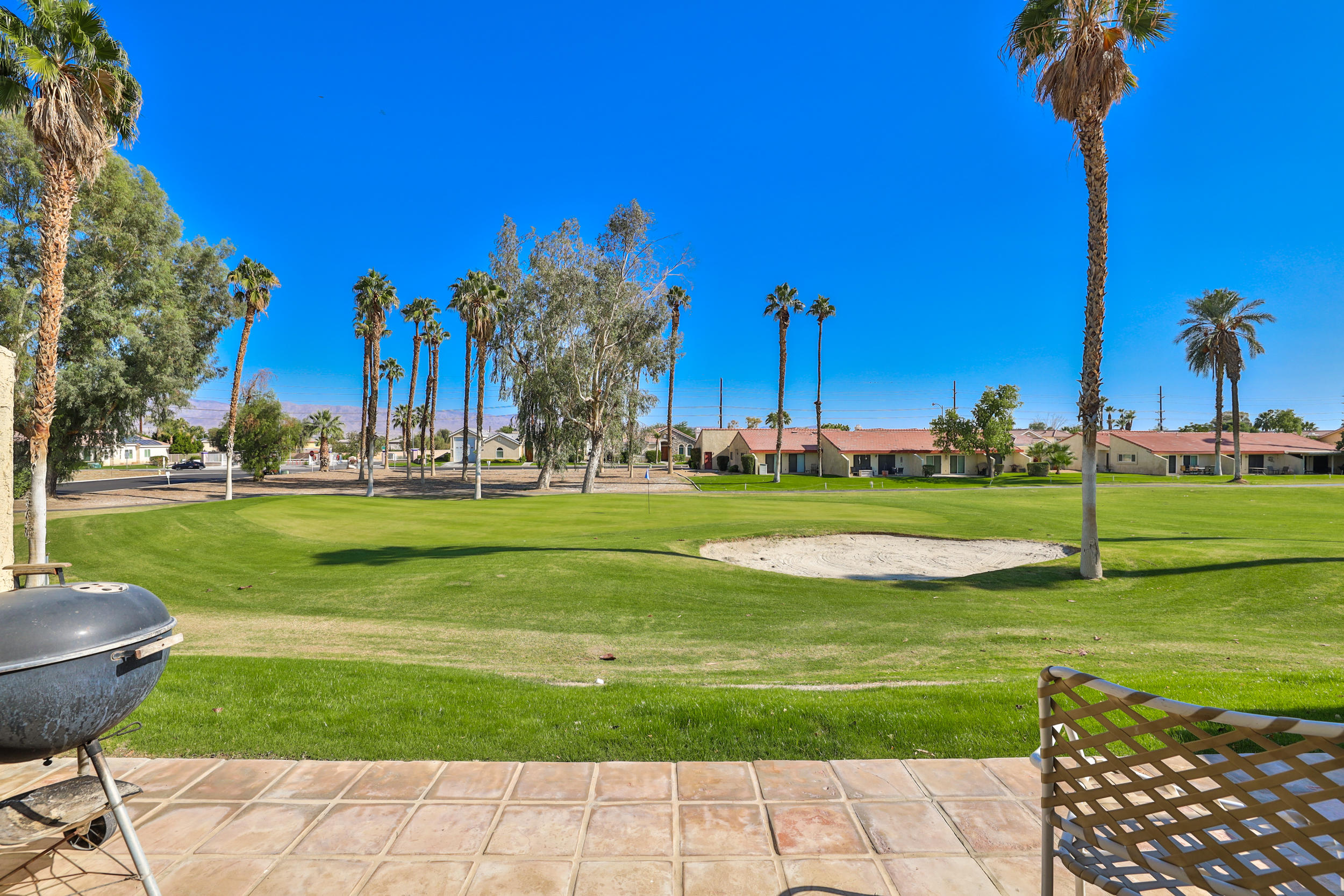 49058 Wayne Street Indio, CA 92201 - Photo 5 of 26 a view of a park and trees