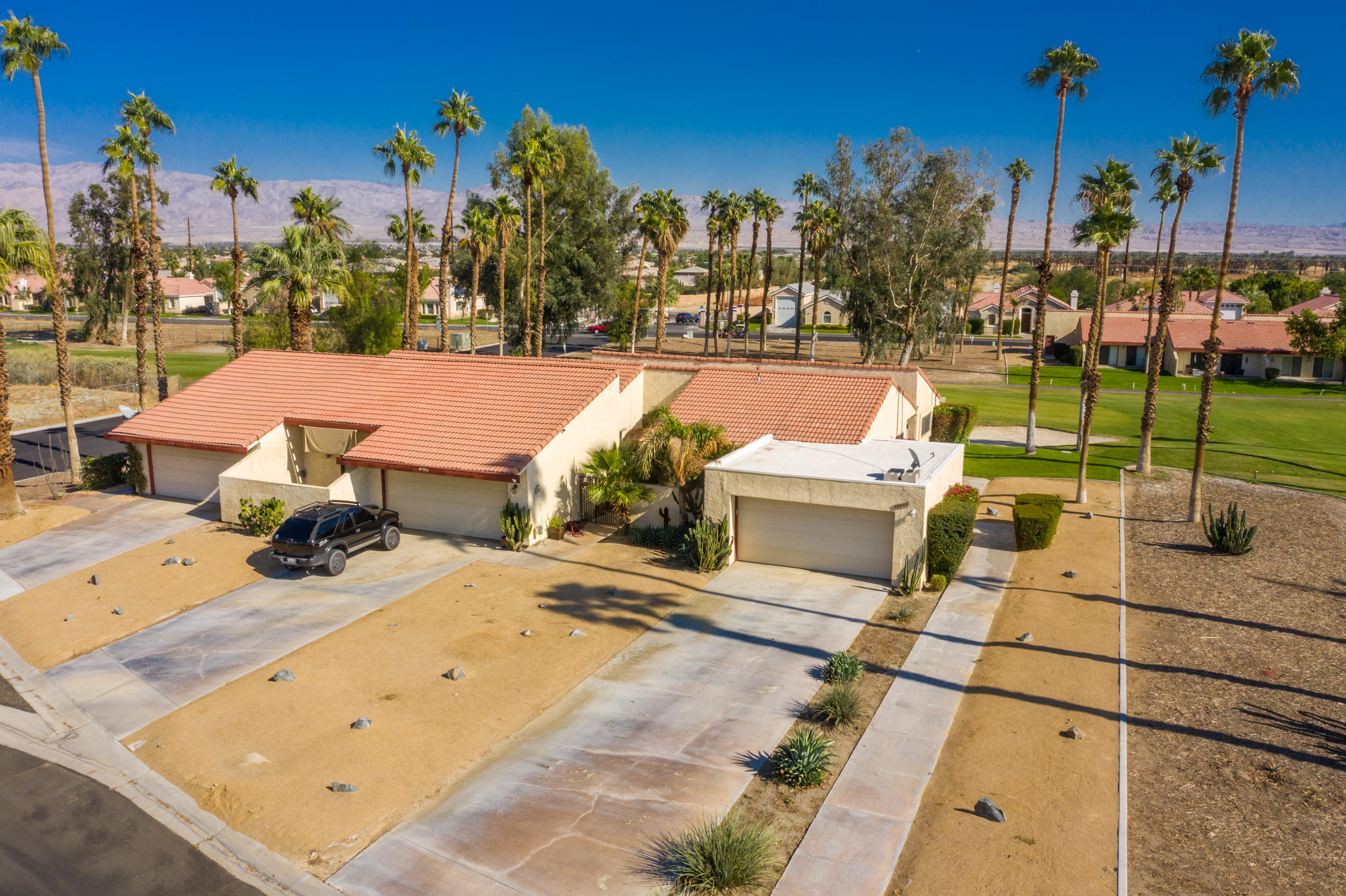 49058 Wayne Street Indio, CA 92201 - Photo 10 of 26 a view of a terrace with chairs