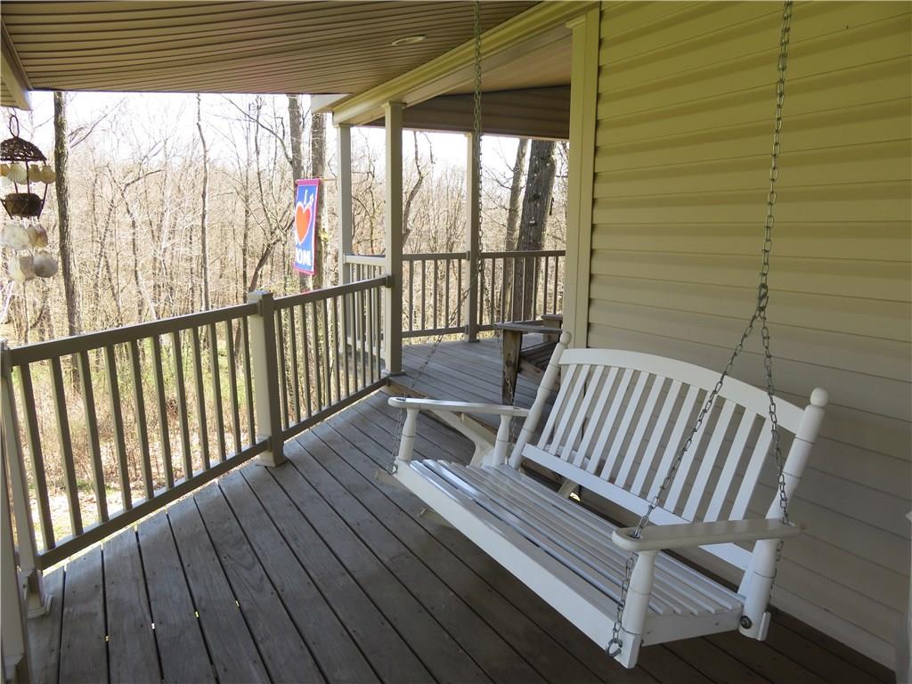 206 Sunbury Road Slippery Rock, PA 16057 - Photo 2 of 24 You will have hours of enjoyment on the covered, wrap around deck overlooking your 3 acre estate!