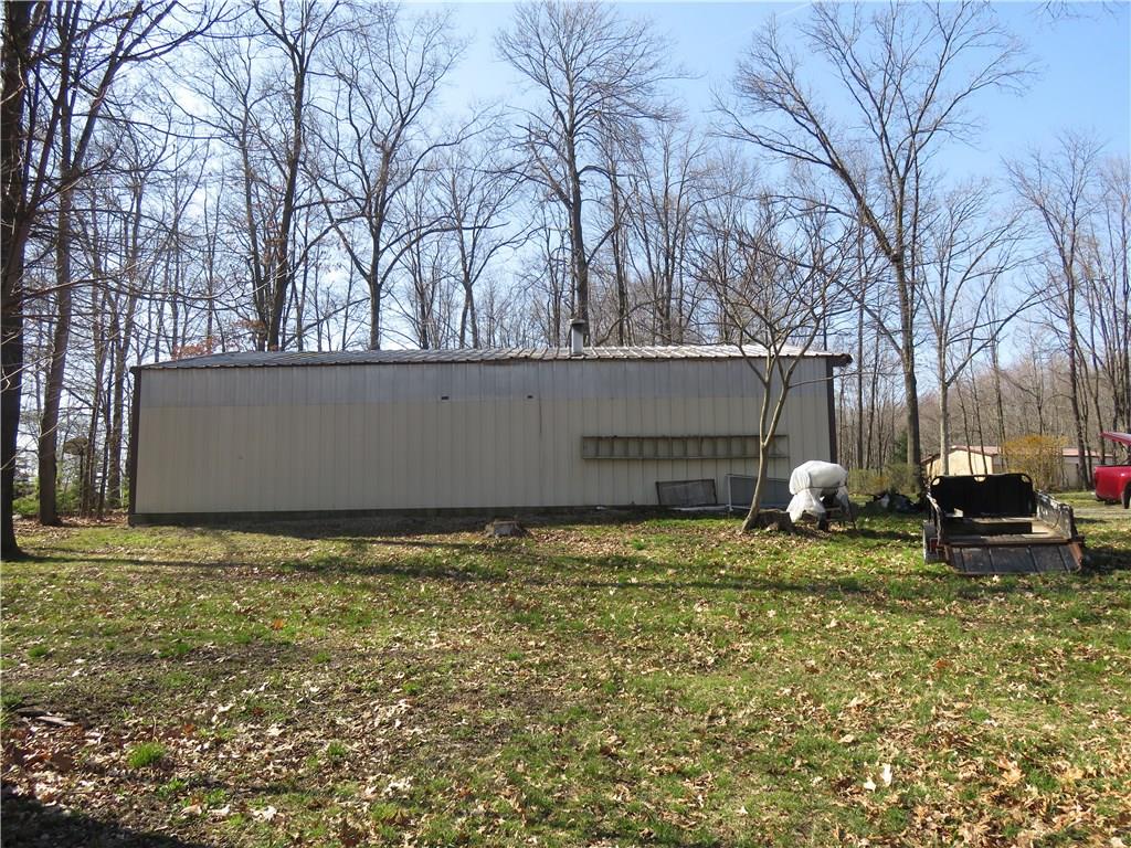 206 Sunbury Road Slippery Rock, PA 16057 - Photo 22 of 24 Side view of the 36x48 detached garage with 200 amp service and 10' eaves with automatic door opener!