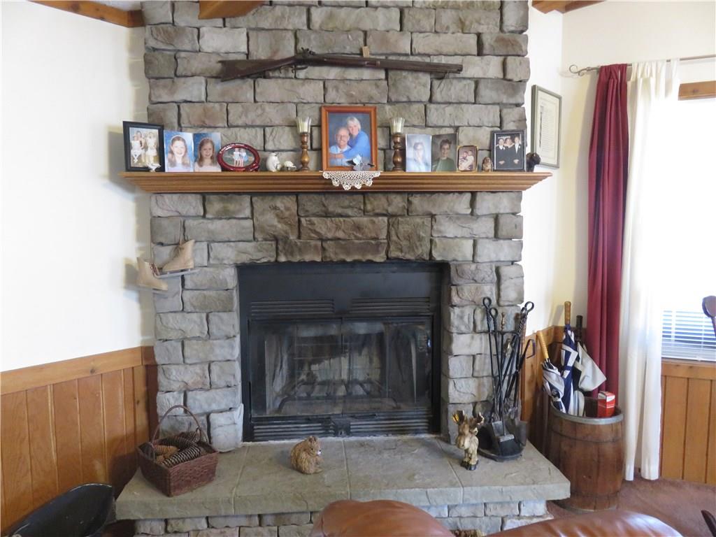 206 Sunbury Road Slippery Rock, PA 16057 - Photo 8 of 24 The wood burning fireplace will keep you warm in the cooler temperatures, and adds a cozy ambiance to the great room!