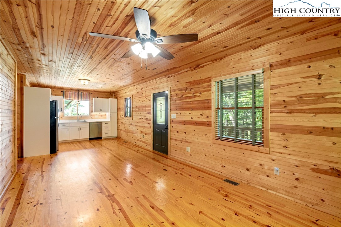 207 Carters Lane Purlear, NC 28665 - Photo 15 of 50 a view of a living room with a wooden floor