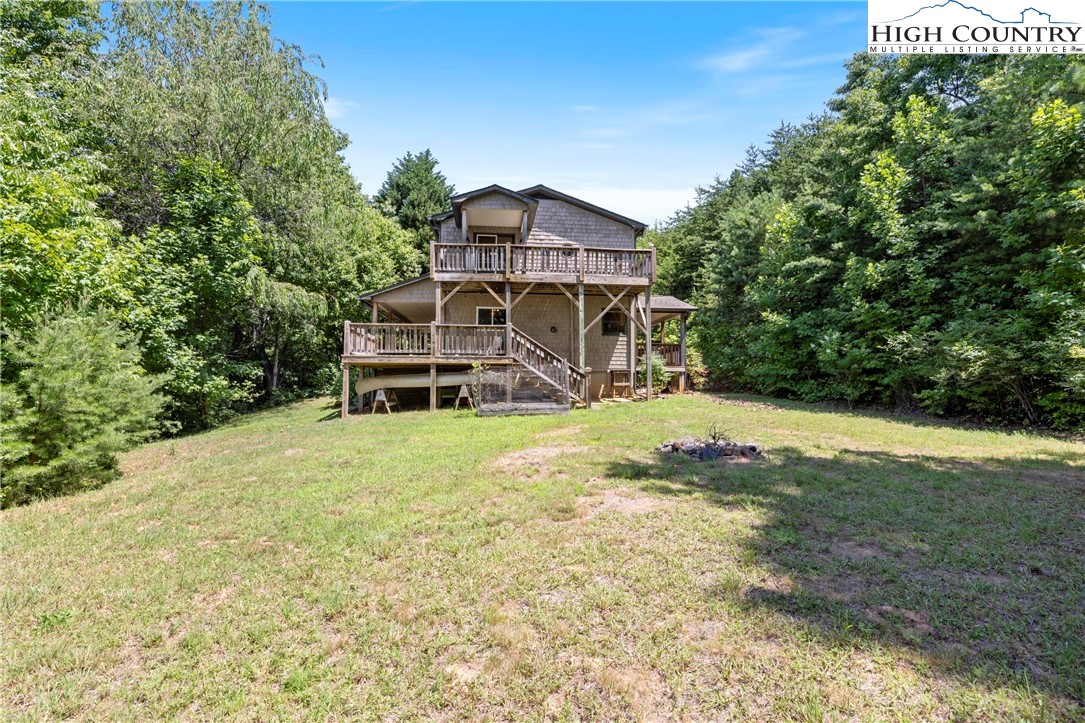 207 Carters Lane Purlear, NC 28665 - Photo 36 of 50 a front view of a house with a yard