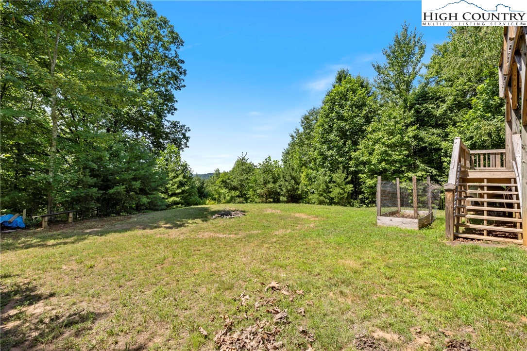 207 Carters Lane Purlear, NC 28665 - Photo 37 of 50 a view of a yard with a house