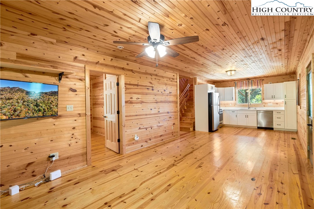 207 Carters Lane Purlear, NC 28665 - Photo 7 of 50 a view of empty room with wooden floor