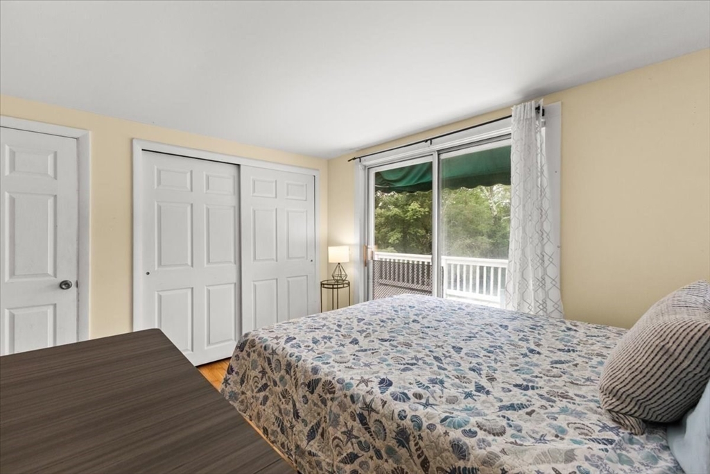 85 Maple Street Bourne, MA 02532 - Photo 17 of 42 a bedroom with a bed and a window