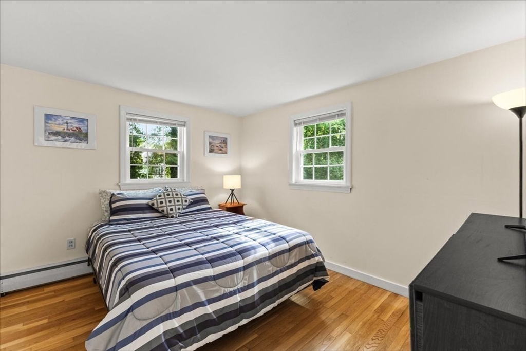 85 Maple Street Bourne, MA 02532 - Photo 24 of 42 a bedroom with a bed and a window