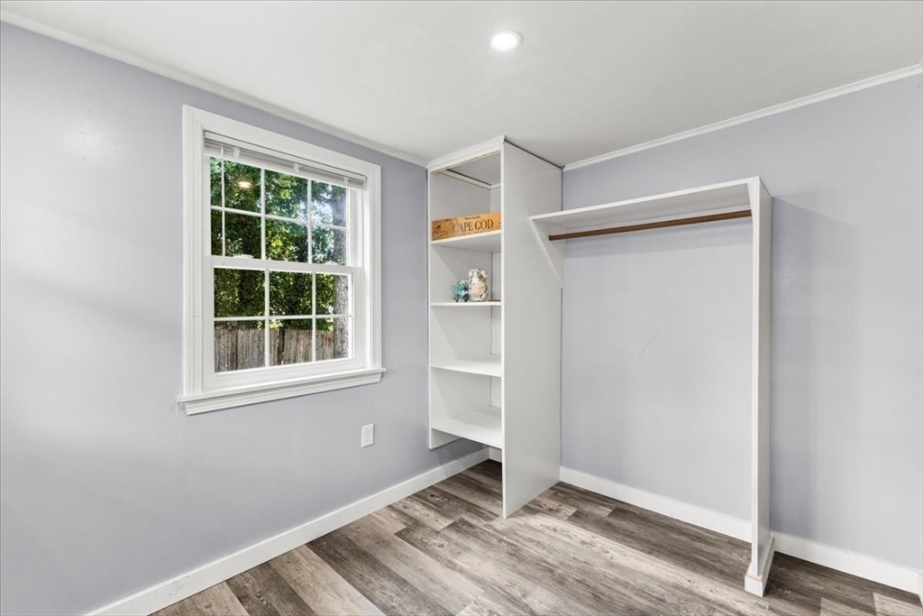 85 Maple Street Bourne, MA 02532 - Photo 26 of 42 an empty room with windows and closet