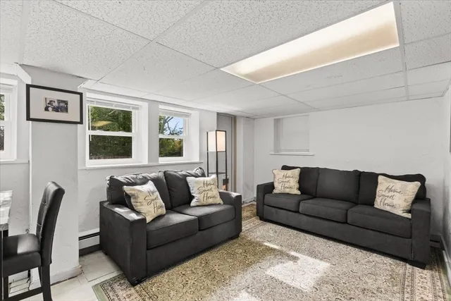 a living room with furniture and a couch