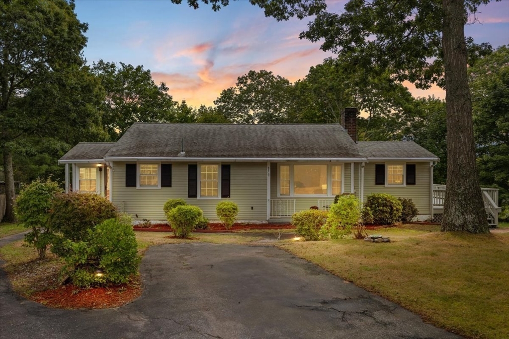 85 Maple Street Bourne, MA 02532 - Photo 41 of 42 a front view of a house with sitting area