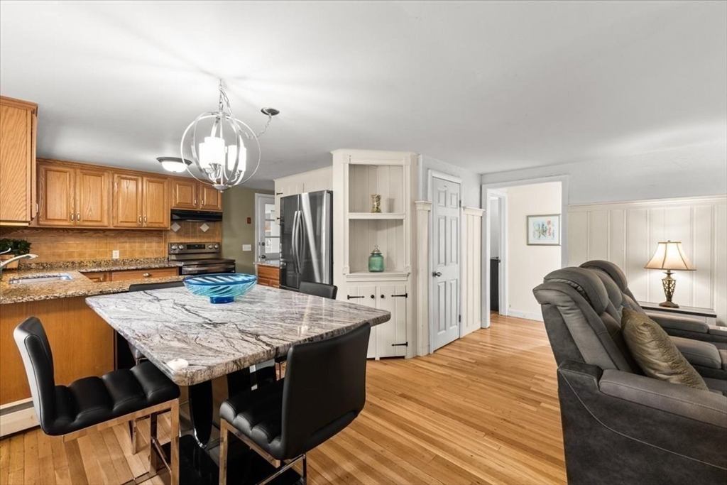 85 Maple Street Bourne, MA 02532 - Photo 9 of 42 a view of a dining room with furniture