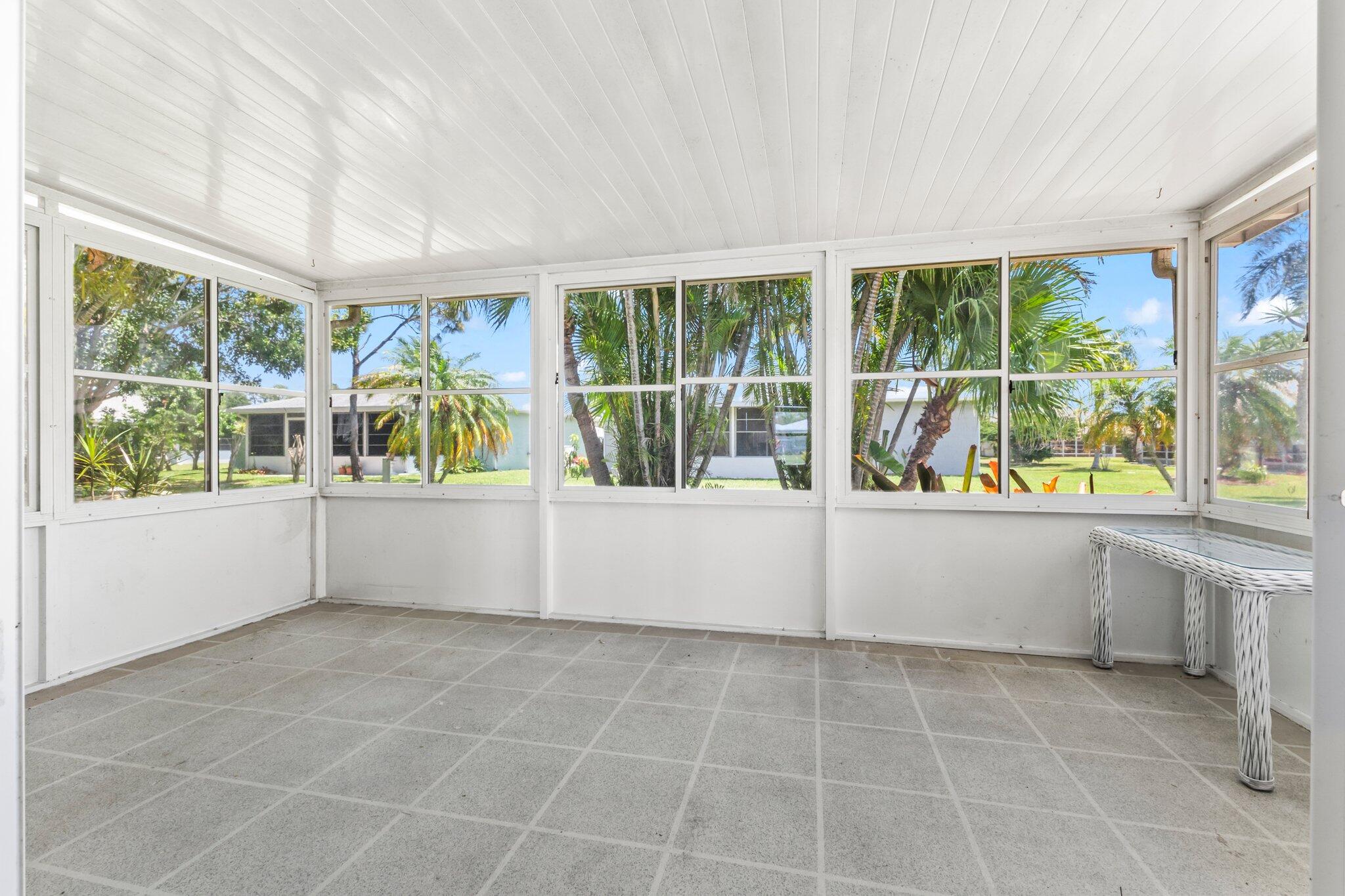 5712 Spindle Place Fort Pierce, FL 34982 - Photo 18 of 35 a view of an empty room with a window