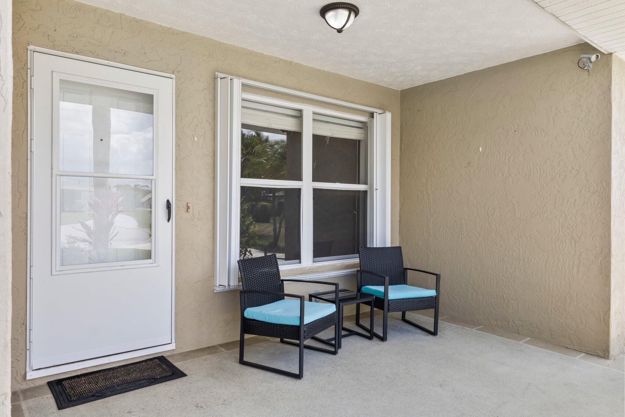 5712 Spindle Place Fort Pierce, FL 34982 - Photo 20 of 35 a living room with furniture and a window