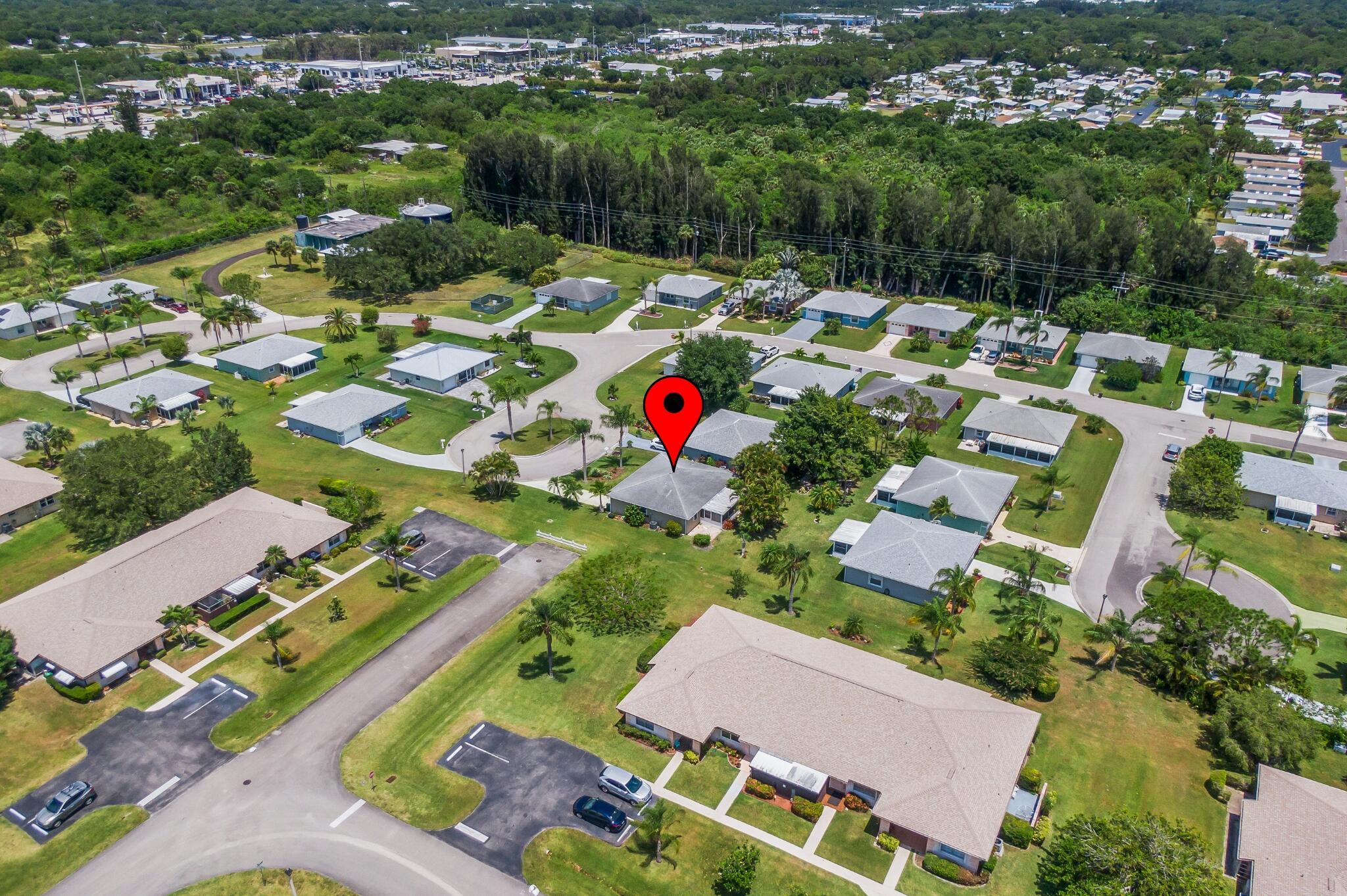 5712 Spindle Place Fort Pierce, FL 34982 - Photo 2 of 35 an aerial view of residential houses with outdoor space and street view
