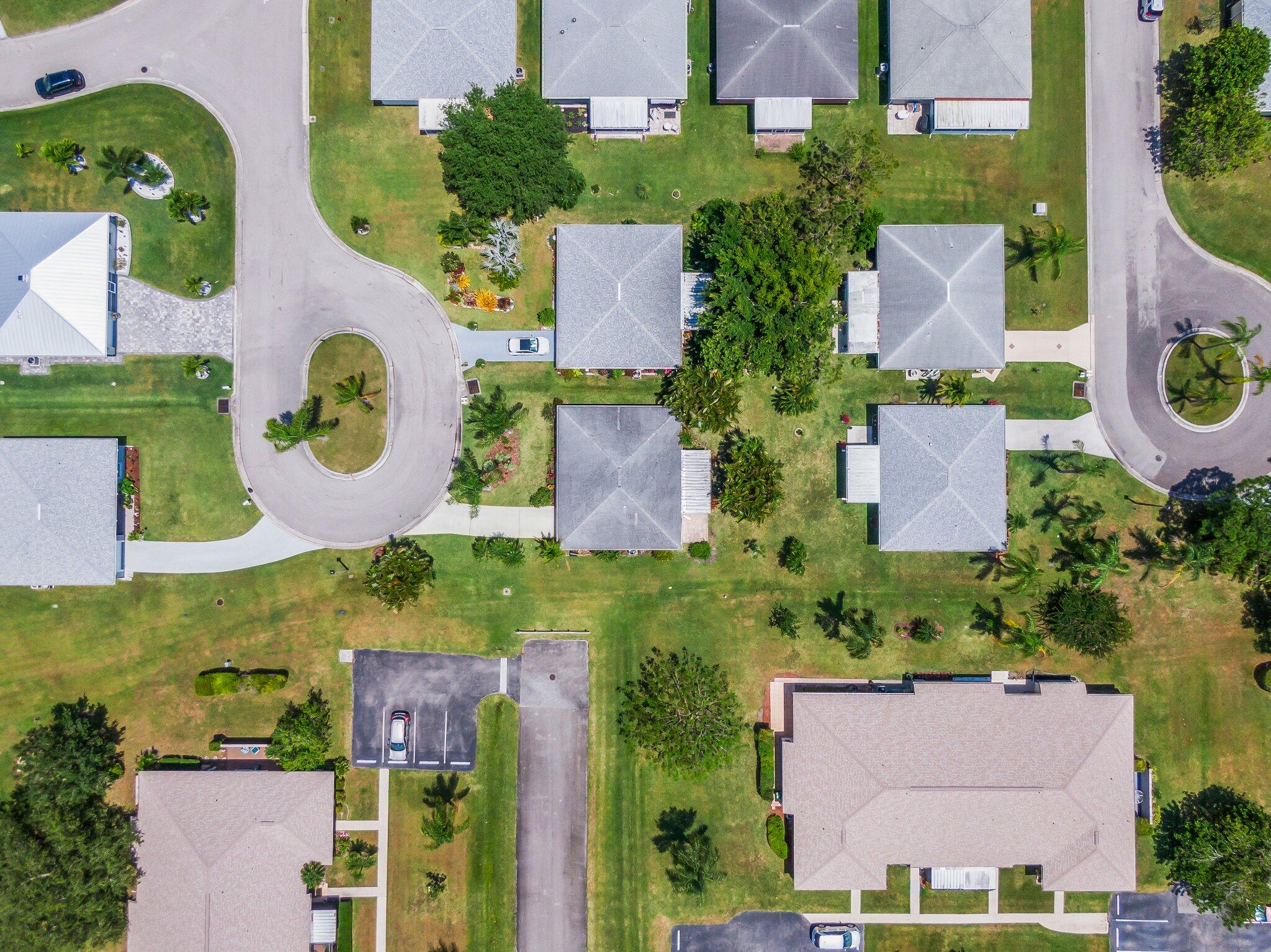 5712 Spindle Place Fort Pierce, FL 34982 - Photo 30 of 35 an aerial view of residential house with outdoor space and swimming pool