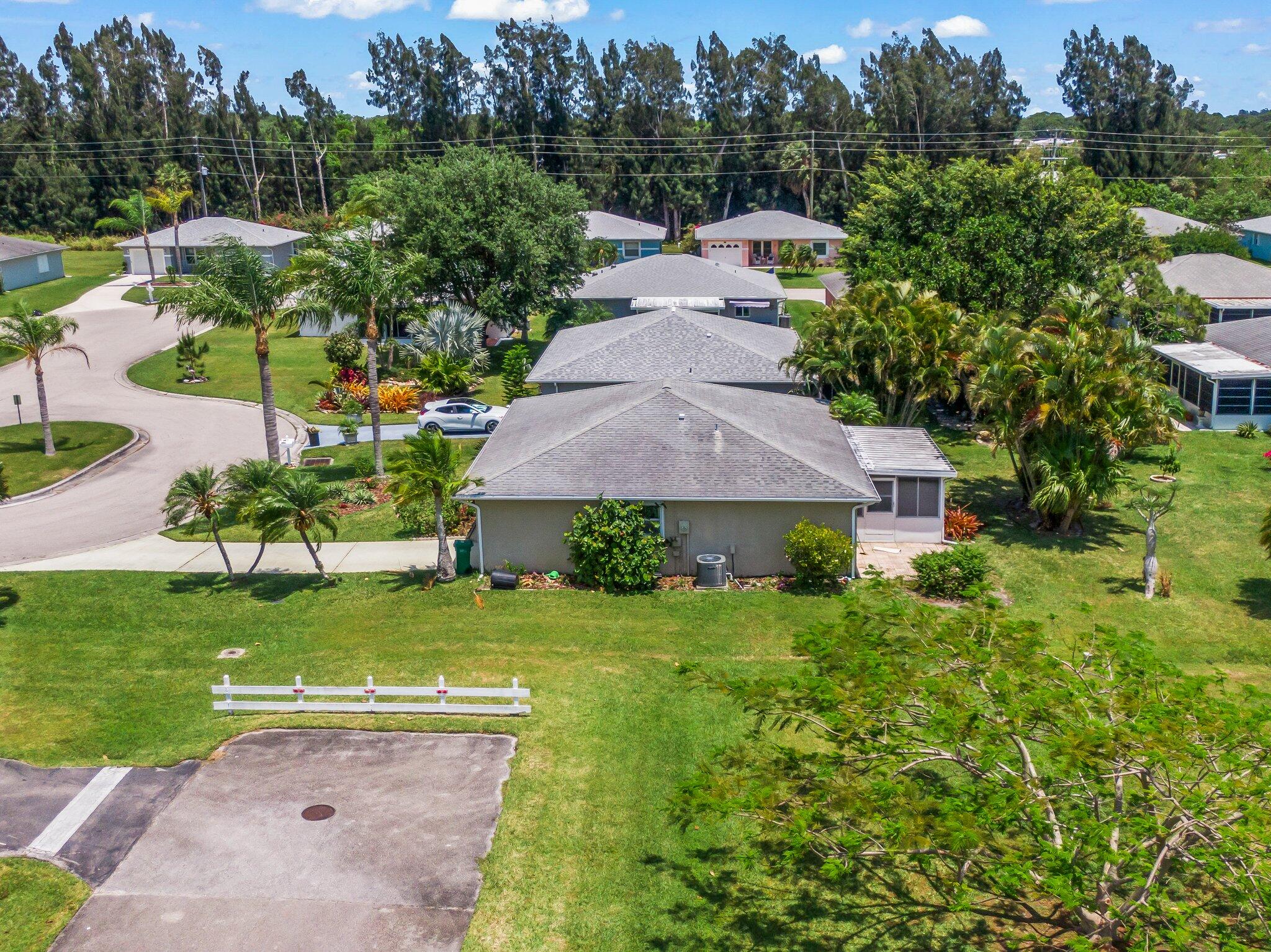 5712 Spindle Place Fort Pierce, FL 34982 - Photo 32 of 35 an aerial view of a house with garden