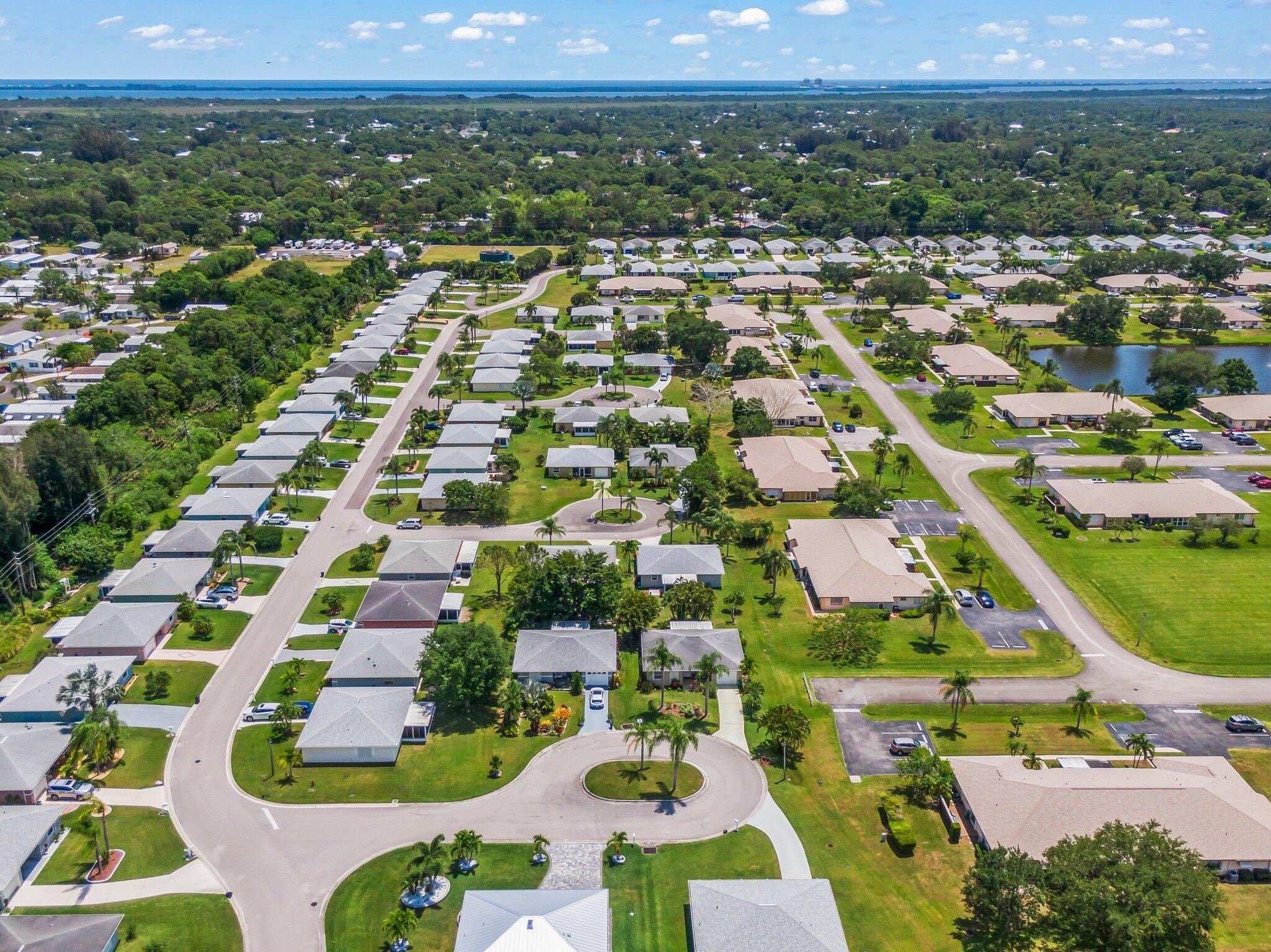 5712 Spindle Place Fort Pierce, FL 34982 - Photo 34 of 35 an aerial view of residential houses with outdoor space and street view