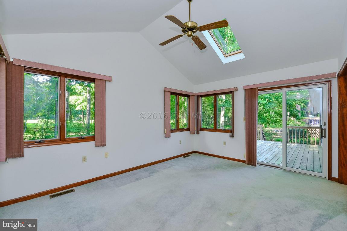241 Windjammer Road Berlin, MD 21811 - Photo 19 of 38 a view of an empty room with a window