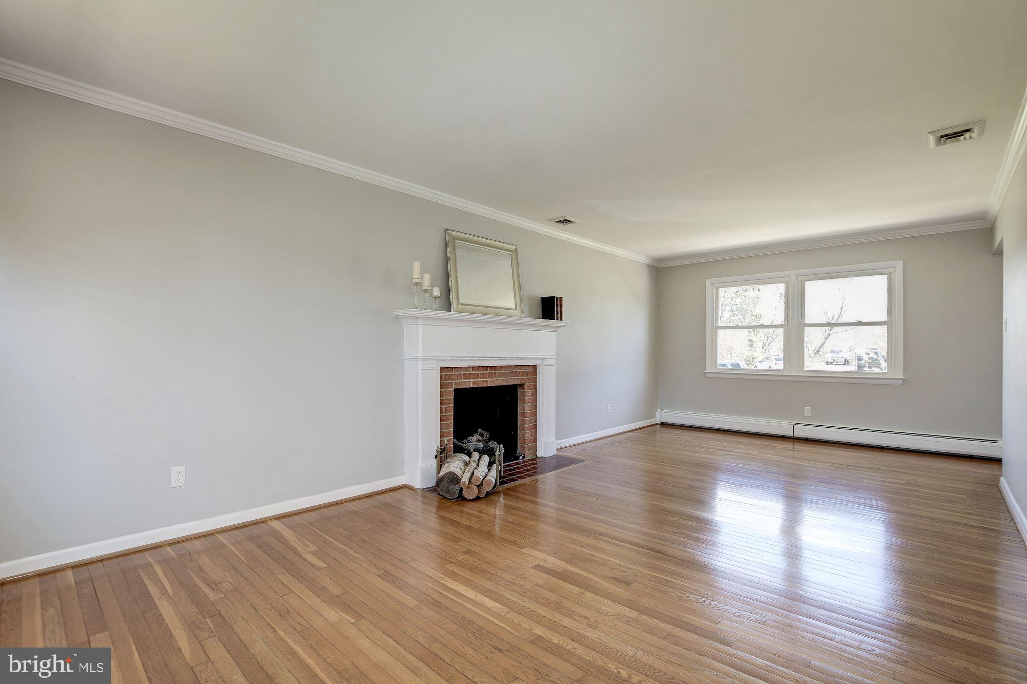 17208 Pinebrook Drive Silver Spring, MD 20905 - Photo 22 of 66 Cozy Wood Burning Fireplace!