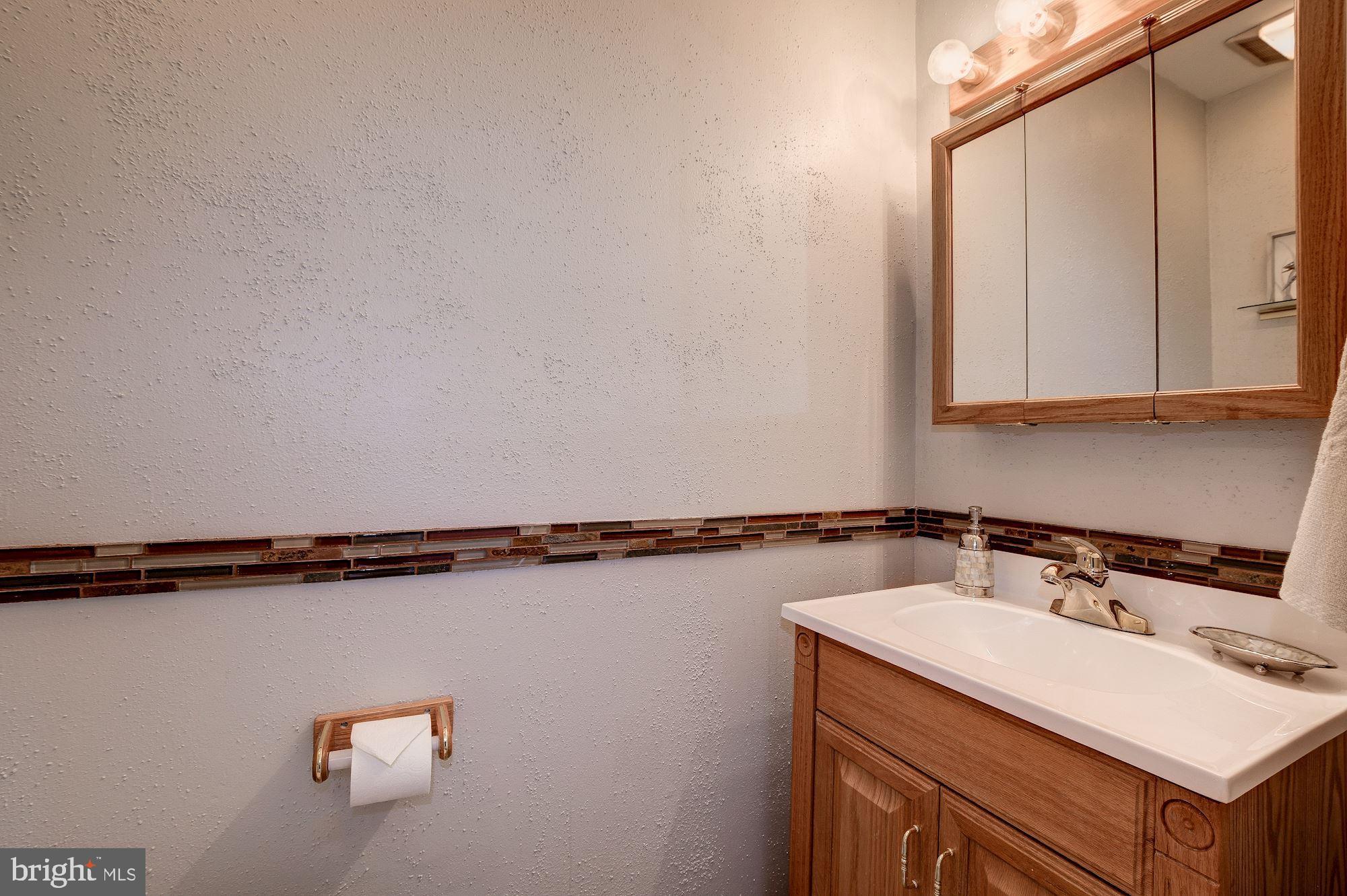 17208 Pinebrook Drive Silver Spring, MD 20905 - Photo 38 of 66 Convenient Powder Room!