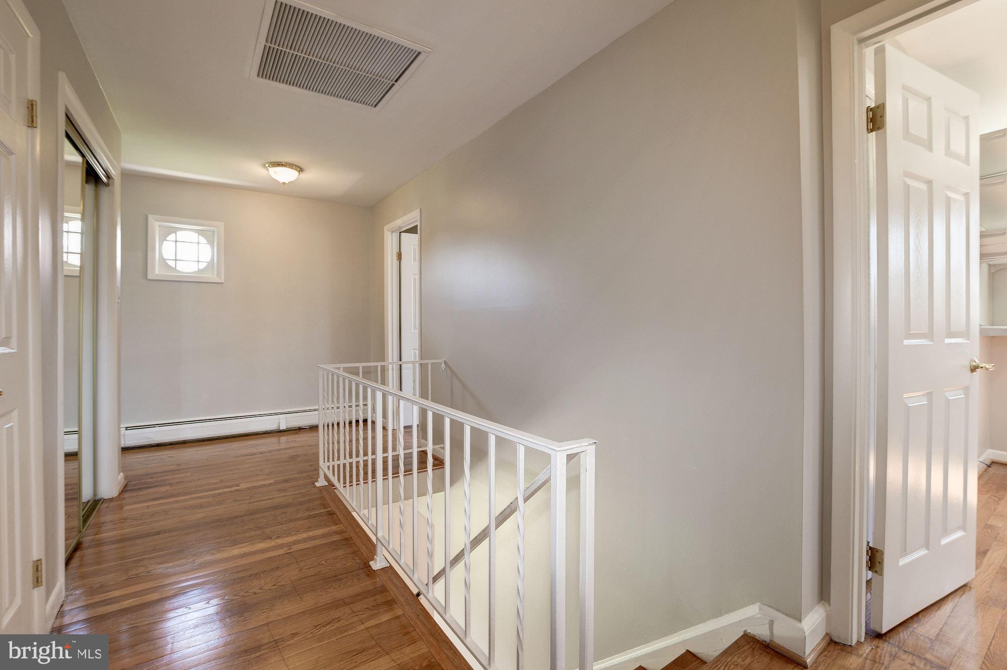 17208 Pinebrook Drive Silver Spring, MD 20905 - Photo 43 of 66 Large Upper Hall!