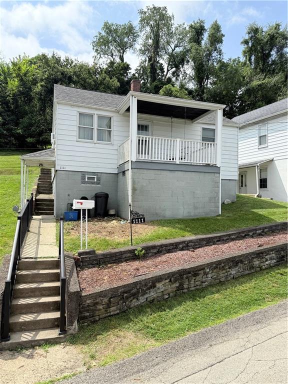 1111 Schang Road Pittsburgh, PA 15236 - Photo 1 of 12 a view of a house with a yard