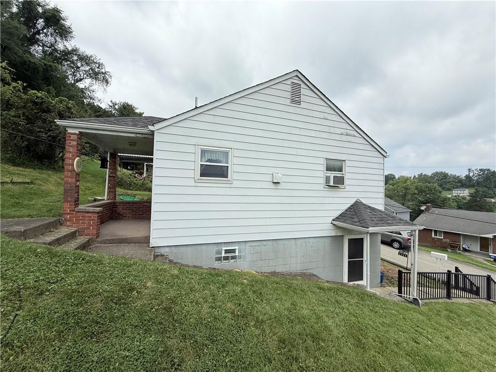 1111 Schang Road Pittsburgh, PA 15236 - Photo 12 of 12 a front view of a house with a yard